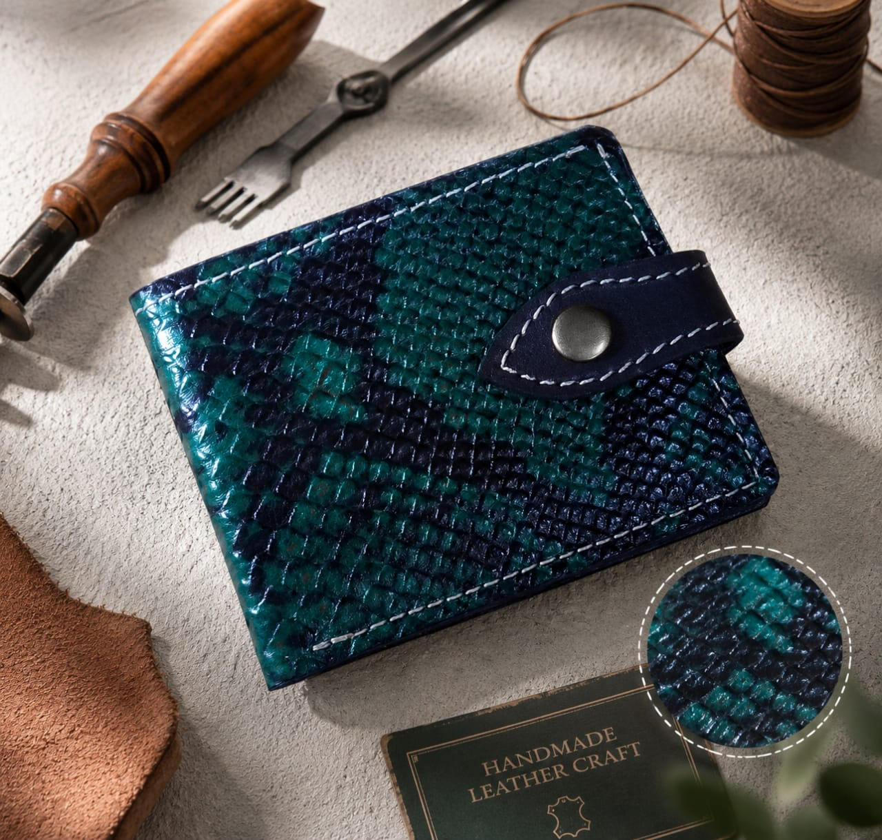 Teal python print leather bi-fold wallet